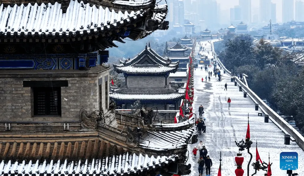 Lantern-Lit City Wall in Winter